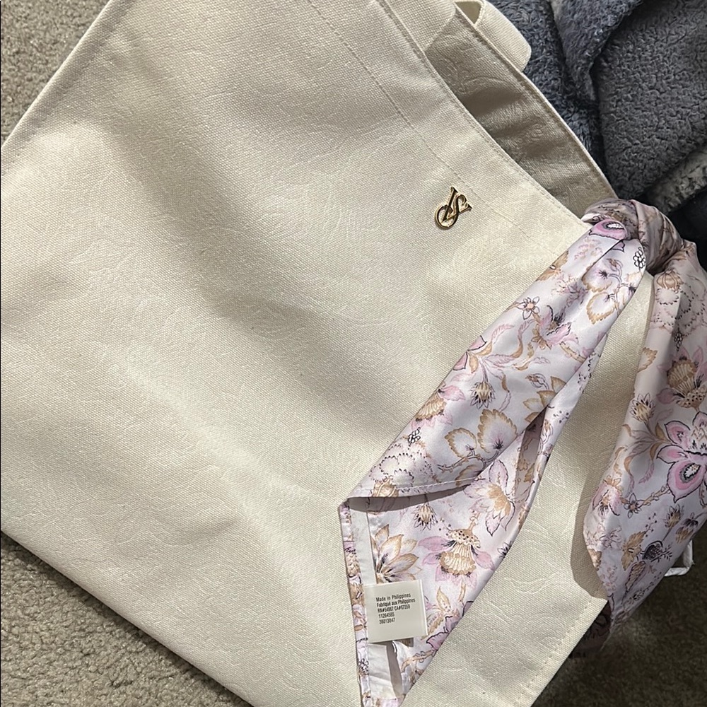 Elegant Cream Tote with Floral Scarf Accent